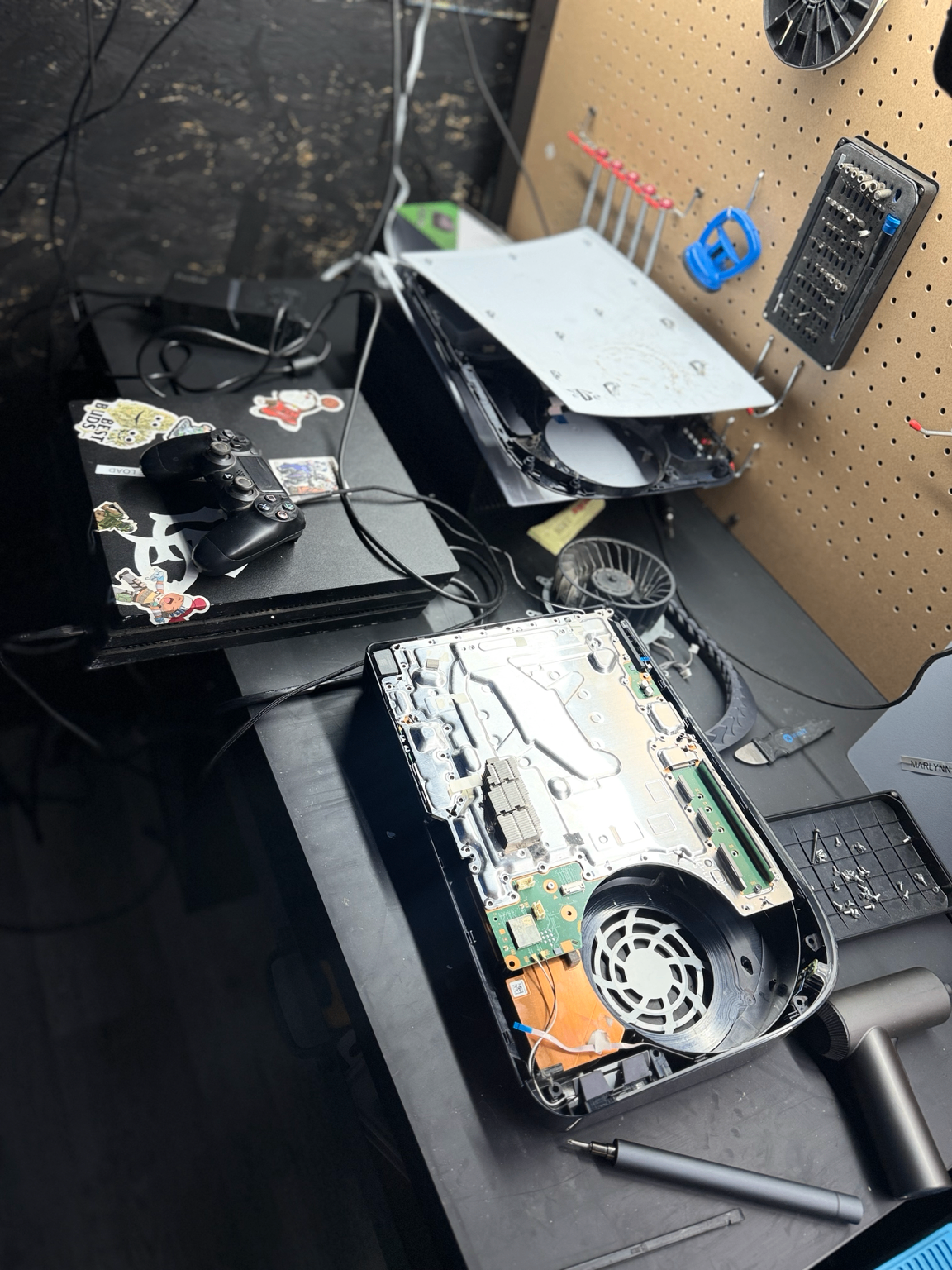 PS5 repair and internal cleaning at OneClick Phone Repairs in Fullerton CA